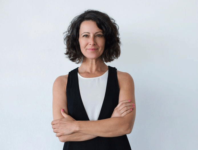 cheerful1-middle-aged-woman-with-curly-hair